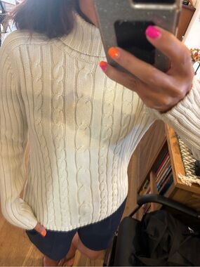 Cable-Knit Cream turtleneck sweater